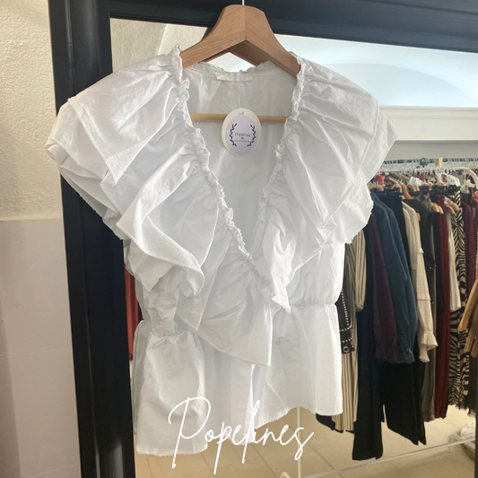 Top frunce volante blanco