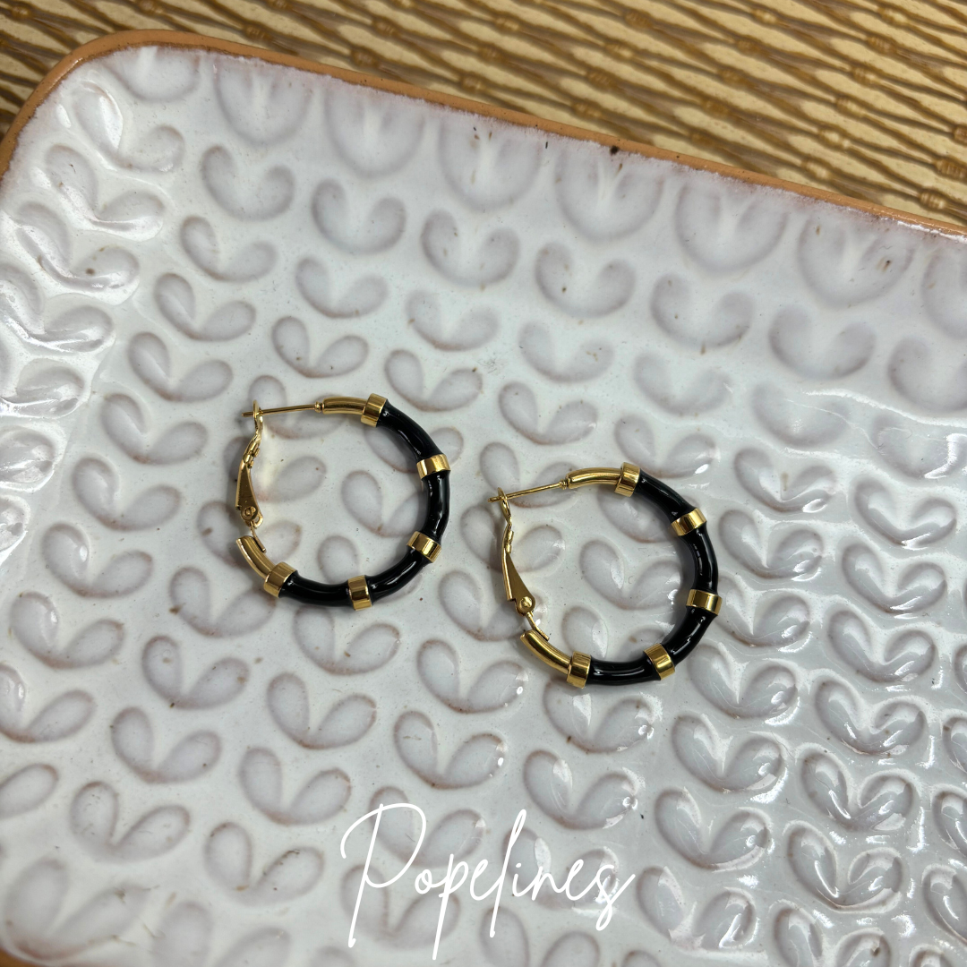 Aritos Paita negros.