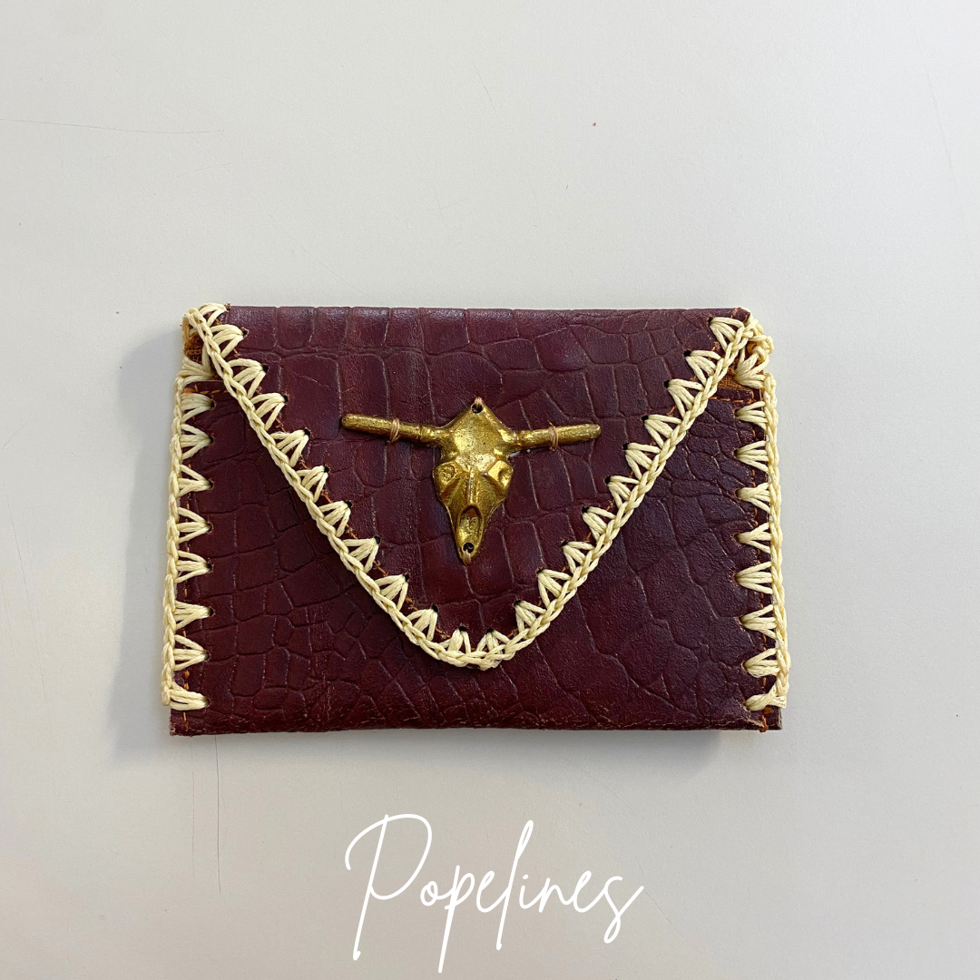 Monedero indu cabeza vaca granate