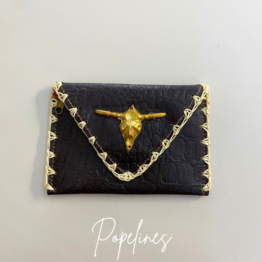 Monedero indu cabeza vaca oscuro