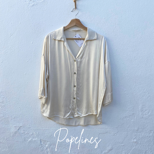 Blusa satinada hueso