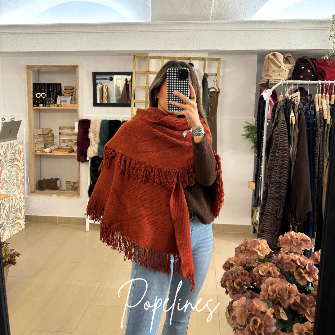 Capa lana flecos caldera