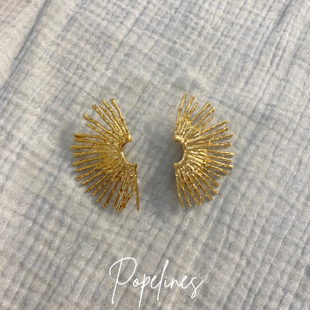 Pendientes sol grandes.