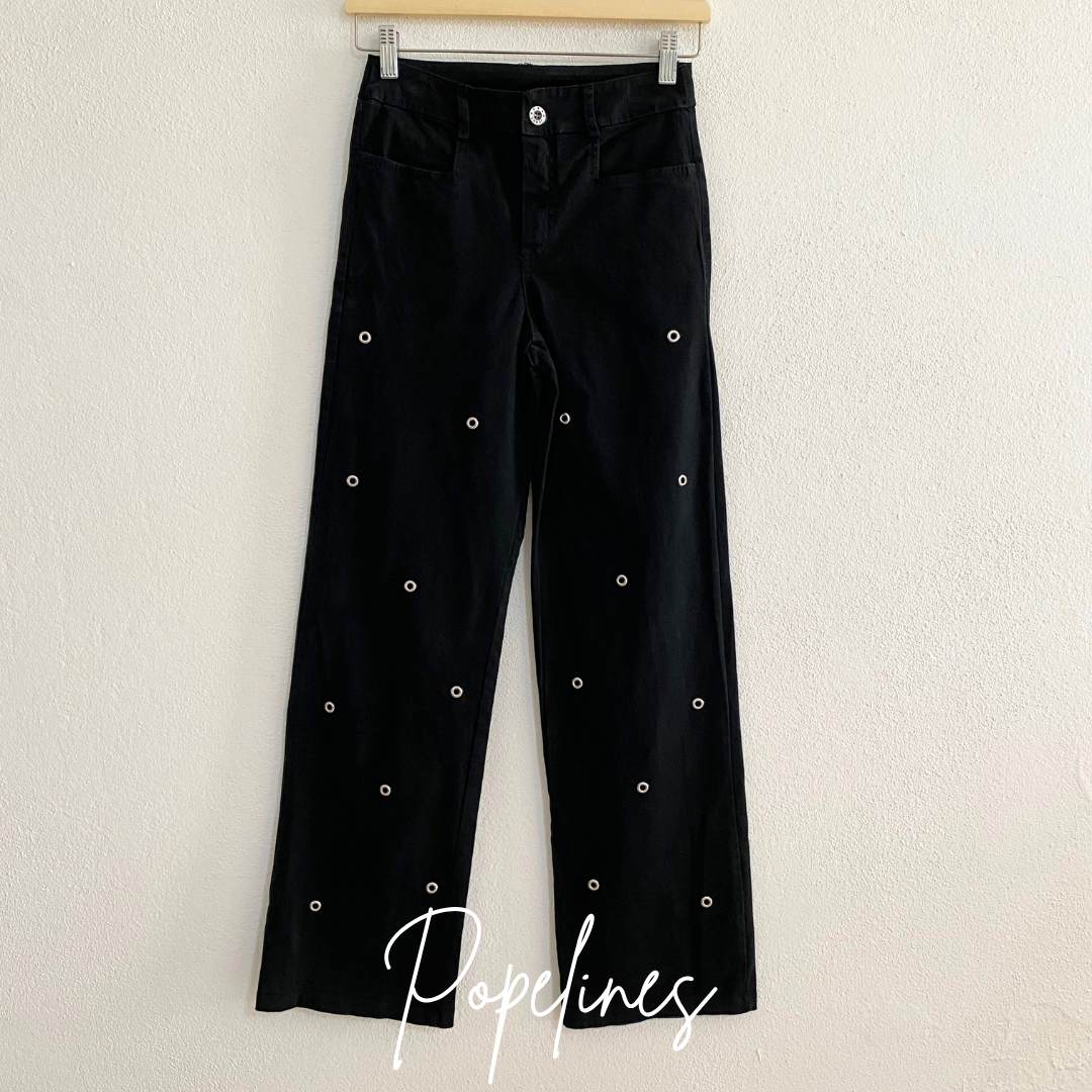 Pantalón arandelas negro