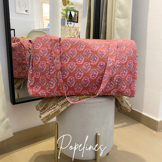 Bolso de viaje estampado floral rosa