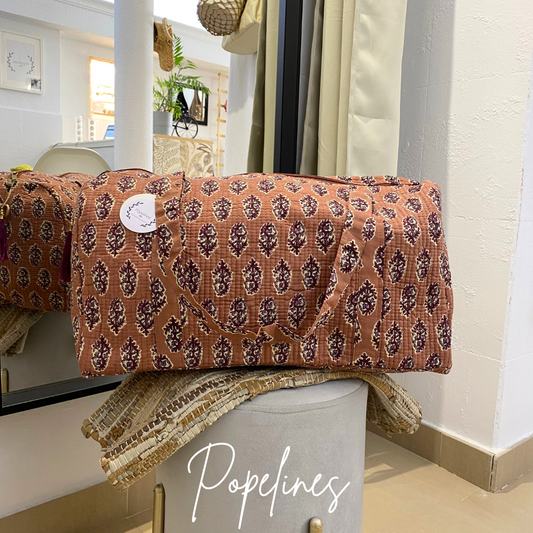 Bolso de viaje estampado rosa palo