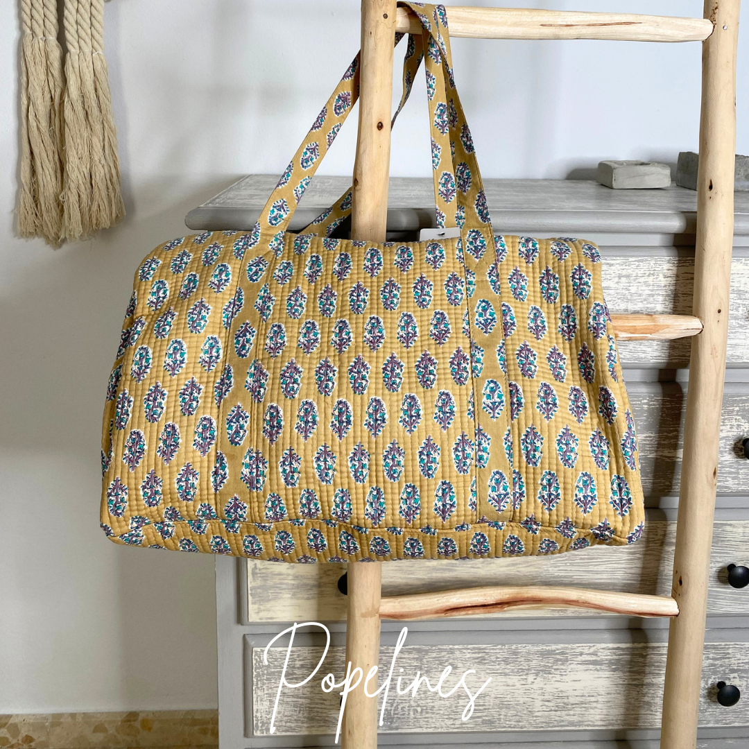 Bolso de viaje estampado ocre