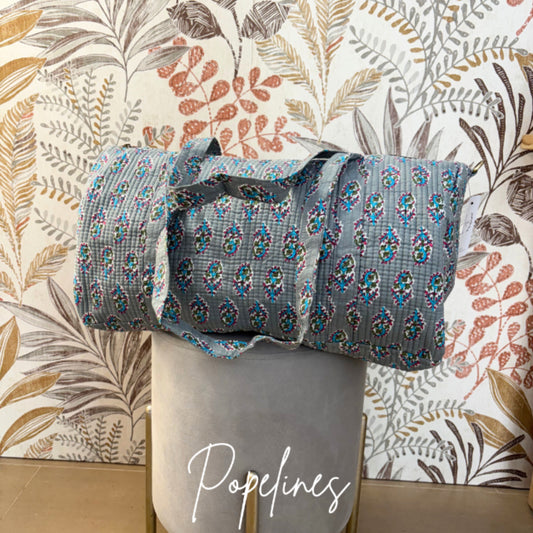 Bolso de viaje estampado azul