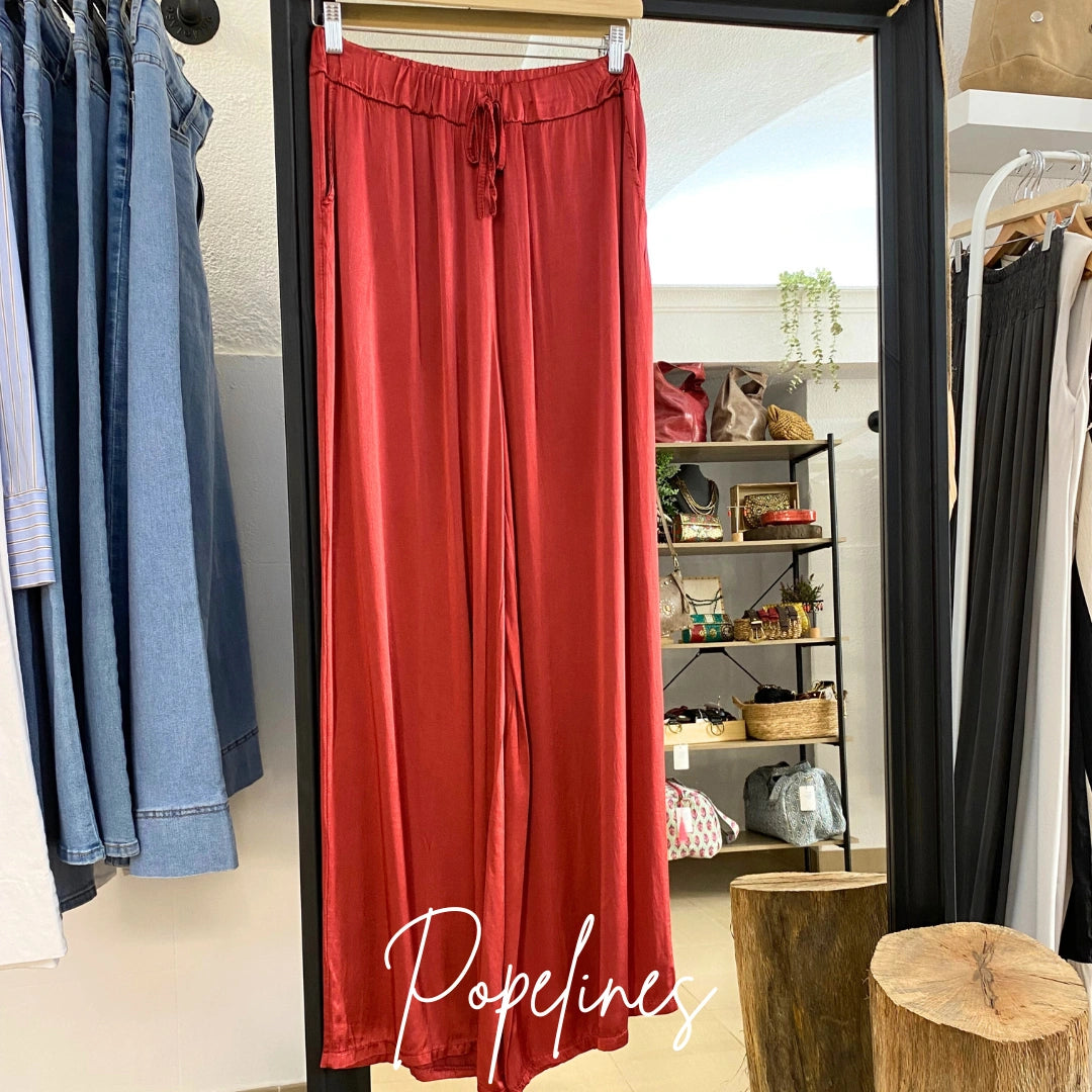 Pantalón satinado vino