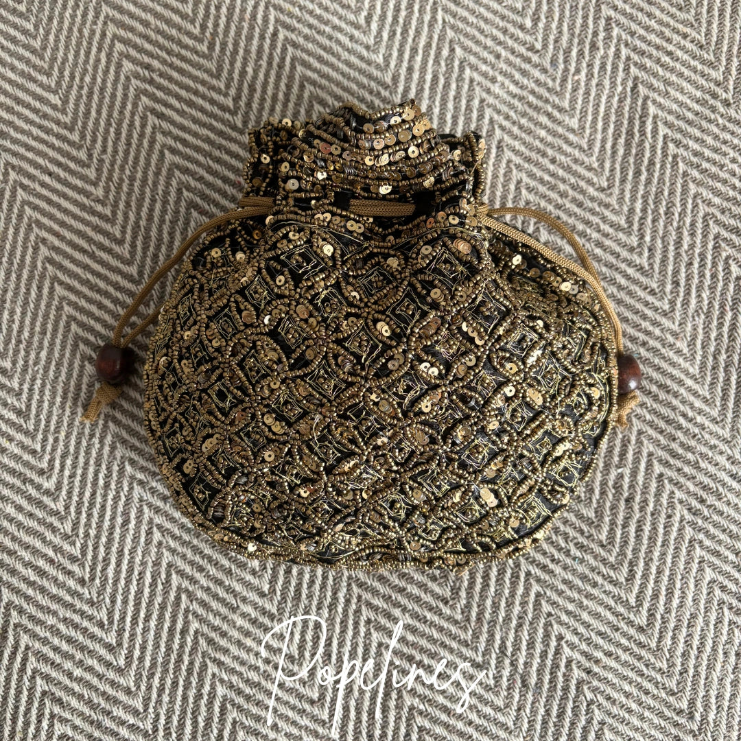 Bombonera cuentas doradas