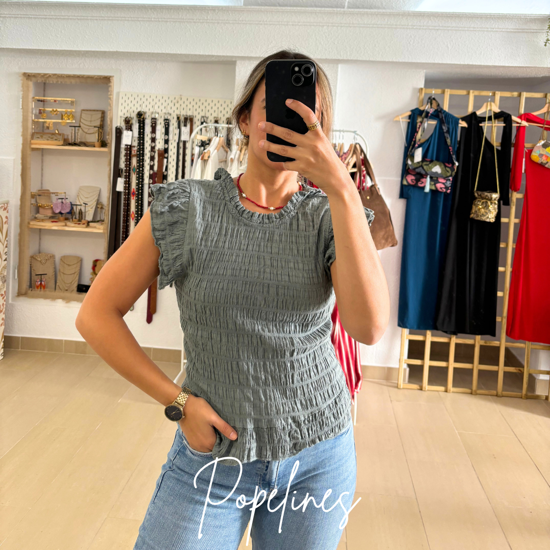 Blusa Lola gris.