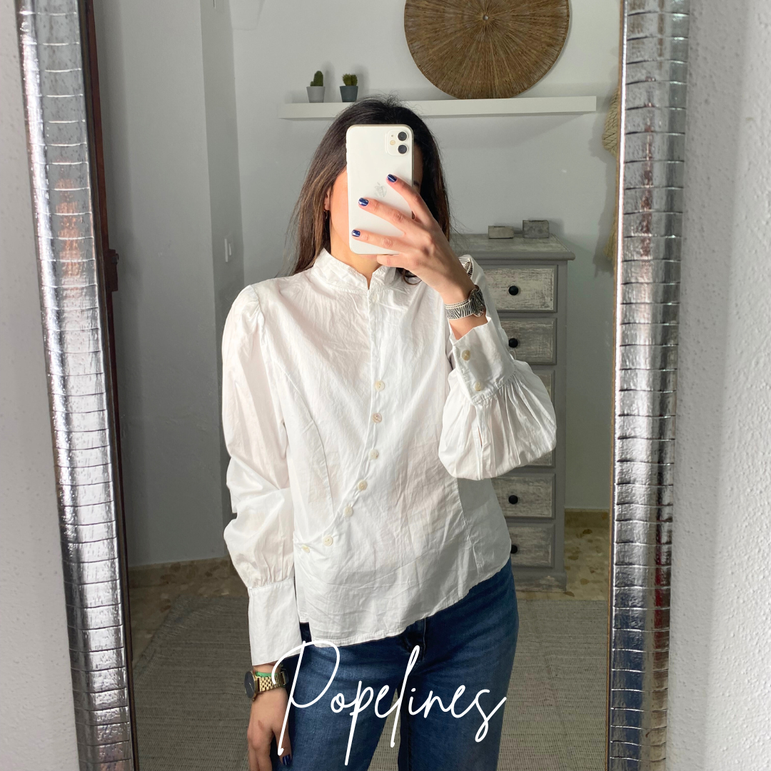 Blusa cruces botones blanca