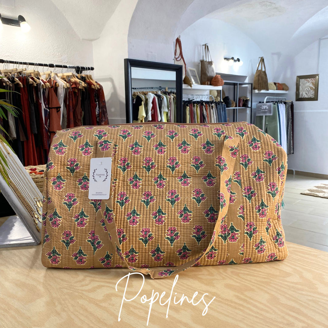 Bolso de viaje estampado rosa palo