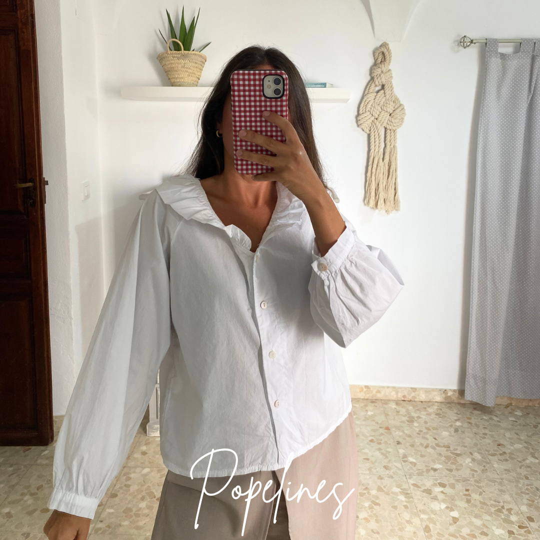 Blusa cuello volante blanca