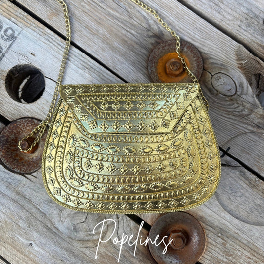 Bolso latón labrado